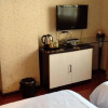 Отель Beichuan Yijia Business Inn, фото 4
