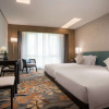 Отель Ramada by Wyndham Zhenjiang City Center, фото 3