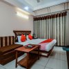 Отель OYO 18484 Hotel Ratnawali, фото 8