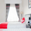Отель Oyo 696 Hasanah Guest House Syariah de Saphire, фото 10