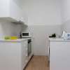 Отель White Arches Apartment в Агиос Тихонас