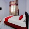 Отель OYO 90543 An-nur Guest House Syariah, фото 9