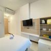 Отель Smart Studio Room Semi Apartment at The Lodge Paskal near BINUS University, фото 1