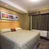 Отель Woodlands Inn & Suites, фото 7