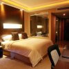 Отель Jundu Center Hotel Yantai, фото 18