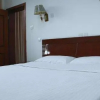 Отель Qufu Huancheng Guest House, фото 6