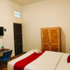 Отель OYO 1957 Riverside Residence, фото 15