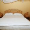 Отель Eden Lawns Uganda Limited в Кампале