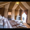 Отель Room in Bungalow - Deluxe Triple Room for Three at Saharian Luxury Camp, фото 6