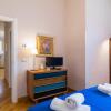 Отель Elegant Flat at Municipio by Napoliapartments, фото 12