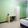 Отель Spot On 2729 Marzan Syariah Guest House, фото 2