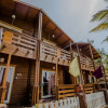 Отель OYO 14146 Home Modern Beach Cottages Morjim, фото 12