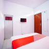 Отель OYO 1064 Manado Airport Homestay, фото 14