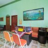 Отель SPOT ON 2490 Griya Kencana Homestay, фото 6