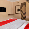 Отель OYO 12301 RG Suites, фото 3