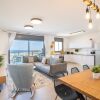 Отель Stylish Seaside Escape with Balcony by Sea N' Rent, фото 14