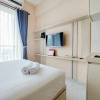 Отель Cozy Design Studio At 21St Floor Sky House Bsd Apartment, фото 3