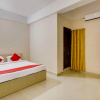 Отель OYO Flagship 22252 Town & Country Inn, фото 3