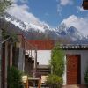 Отель Yunzhong Baisha Lijiang Inn, фото 1