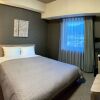 Отель Route Inn Shinano Omachi Ekimae, фото 17