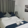 Отель The Grand Orchid Guesthouse, фото 5