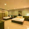 Отель The Green Beach Resort, фото 1