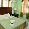 Отель Aanola Villas 6a Tranquil Privy Bedroom в Кастри