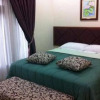 Отель Pondok Ambu Guest House Gegerkalong, фото 5