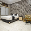Отель OYO 2469 Sutomo Homestay, фото 12