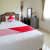Отель OYO 734 Tuban Torres Accomodation, фото 7