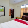 Отель Oyo 91587 Griya Buah De5 Syariah, фото 7
