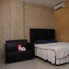 Отель Nida Rooms Muara 16 Polonia at House of Zaza Zizi, фото 6
