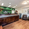 Отель HomeTowne Studios by Red Roof Orlando South, фото 2