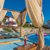 Отель Holiday House with Private Pool for 6-8 Persons in the Holiday Park Jelovci, фото 25