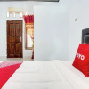 Отель Wisma Amalia Syariah by OYO Rooms, фото 15