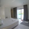Отель Villa Ozone Pattaya в На-Чом-Тхиане