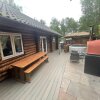 Отель Woodpecker Log Cabin with hot tub, pizza oven bbq entertainment area, lakeside with private fishing , фото 32