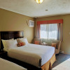 Отель Alpine Inn & Suites, фото 3