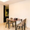 Отель Cozy 2BR @ The Empyreal Condominium Epicentrum Apartment, фото 12