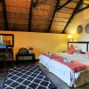Отель Hluhluwe River Lodge, фото 4
