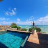 Отель Luxury beachfront villa with private pool and cozy Pavillon with private jacuzzi on rooftop terrace, фото 1