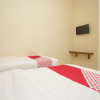 Отель OYO 952 Annisa Syariah Guest House, фото 5