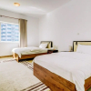 Отель Palatial 2BR Apartment with Sleek Finish, фото 16
