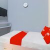 Отель OYO Life 92691 Mc Kost Syariah, фото 14
