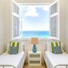 Отель Long Bay Villas - Villa Sky, фото 4