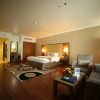 Отель Golden Tulip Suites Breida Al Q, фото 7