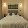 Отель Cosy 2-bedroom home with garden and free parking, фото 3