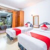 Отель Oyo 943 Hotel Azalea Syariah, фото 4