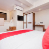 Отель OYO 15732 Qubestay Airport, фото 2