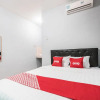 Отель OYO Living 1756 Amira Guest House, фото 5
